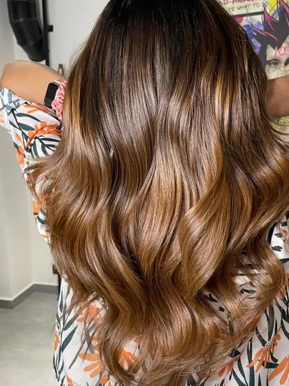 I'm crazy for hair color. This look features a beautiful warm balayage on long, healthy hair.