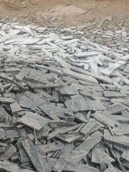 For a new project at the base of Nandi Hills, we are using waste off-cuts from nearby granite processing facilities. This pile of discarded stone will become the load-bearing walls of the house.