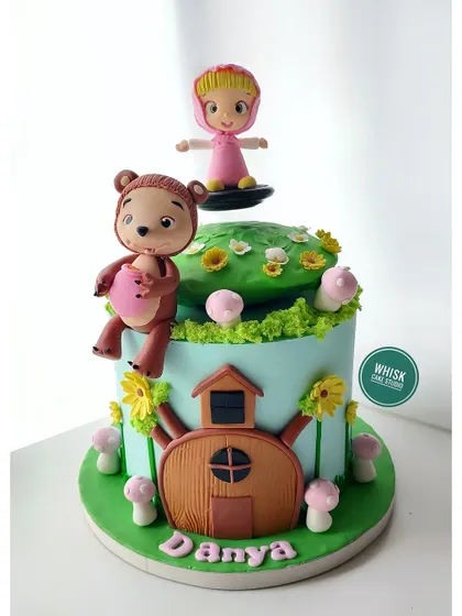 Masha and the Bear in a floating cake design. This semi-fondant cake features a floating top tier where Masha stands, creating a magical scene from the popular cartoon.