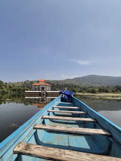 A boat ride towards the beautiful Varanga Kere Basadi, a Jain temple located in the middle of a lake.