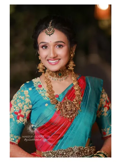 The lovely Dr. Vishnu Priya with a subtle and delicate makeup look. This style enhances her natural beauty, proving that makeup can be understated and still make a significant impact.