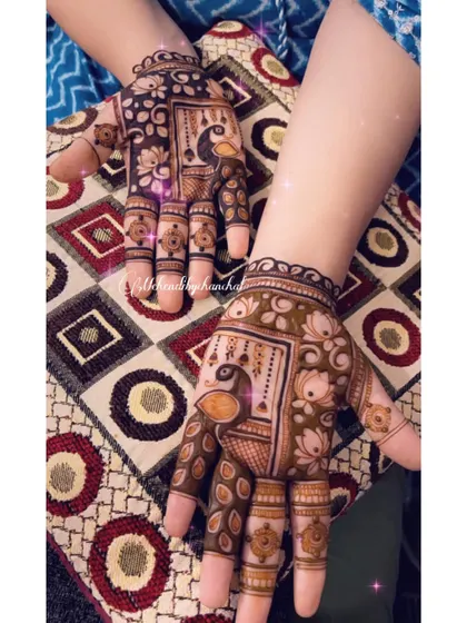 A minimal yet beautiful Karwa Chauth design featuring peacocks and lotuses, perfect for someone who wants a festive but not-so-heavy look.