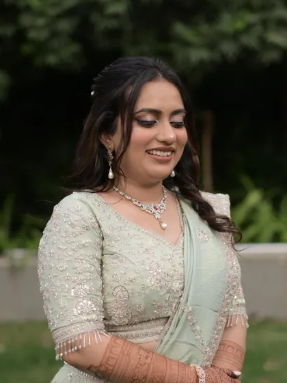 A close up of Vidhi's engagement makeup. The blended smokey eye and flawless skin create a look that is both glamorous and sophisticated.