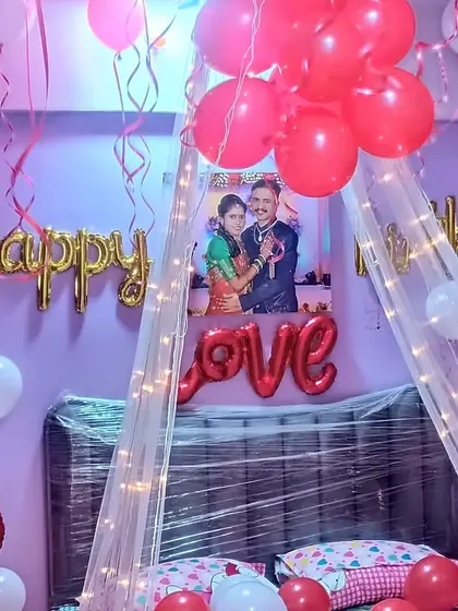 A close-up of the personalized canopy decoration, featuring a photo of the couple.