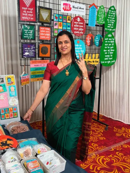 This is me, Anila, at one of my exhibitions, surrounded by my creations. Every single item you see is designed and handcrafted with a lot of love and care. It brings me so much joy to share my passion with you.