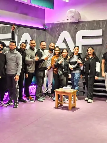 We are more than a gym; we are a community. This is our team and some of our amazing members celebrating our collective strength and commitment to fitness.