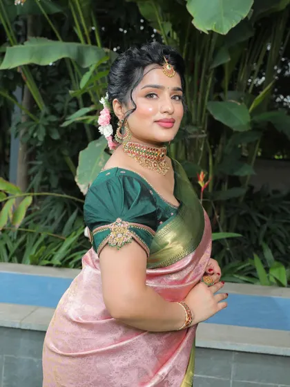 A close-up of the custom puff-sleeve blouse we designed to go with the saree.