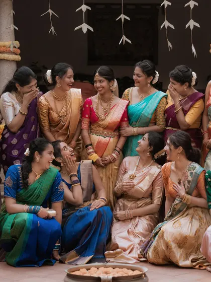 A candid moment of laughter and secrets shared between the bride and her bridesmaids. These are the unscripted, joyful interactions that I love to capture during the wedding day.