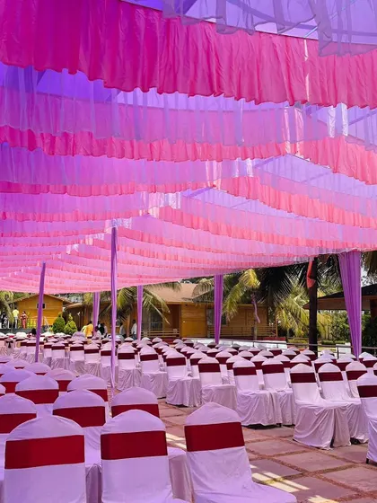 The seating arrangement for the purple Haldi, with rows of chairs ready for a grand celebration.