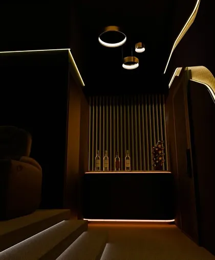 A view from the back, showing the tiered layout and the elegant pendant lighting over the bar area. This ensures the space is functional and beautiful from every angle.