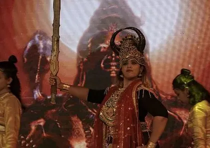 The character of Raavan, portrayed by Lakshmy Ramakrishnan, holding court in our 'Ramayan' production. The costumes, lighting, and visuals all came together to create a powerful stage presence.