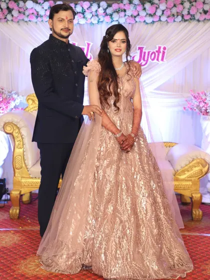 Glowing in gold for her engagement. This shimmering pastel ball gown is a glamorous choice that ensures the bride-to-be shines bright on her special day.