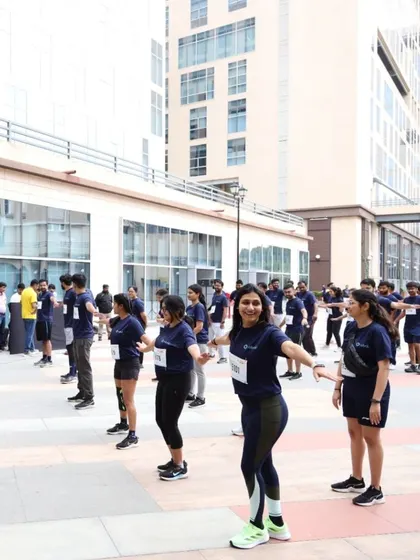 Leading the warm-up for the Rubrix 5K Run. It's amazing to see a sea of people moving in sync, ready to take on the challenge.