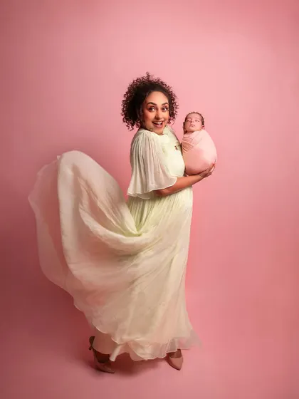 A fun, dynamic shot with Pearle's dress flowing. It captures her vibrant personality while still being a tender mother-daughter portrait.