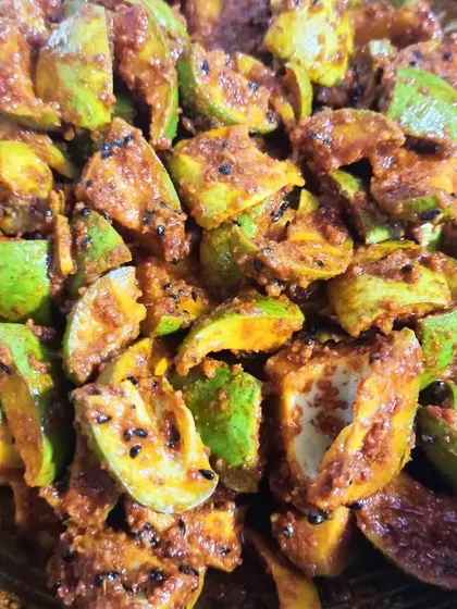 A large batch of my Mango Pickle being mixed. This shows the scale at which I can produce while still maintaining the hands-on, homemade quality.