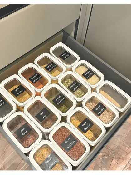 Labeling is not just for looks, it saves time and reduces stress. These bilingual labels on dal containers make it easy for everyone in the family to find what they need.