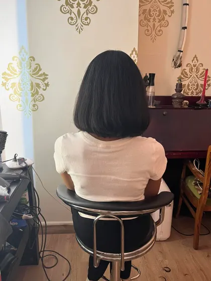 The back view of the clean, classic long bob.