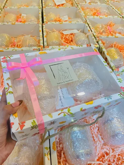 The final packaged wedding favor box, ready to be gifted to guests.