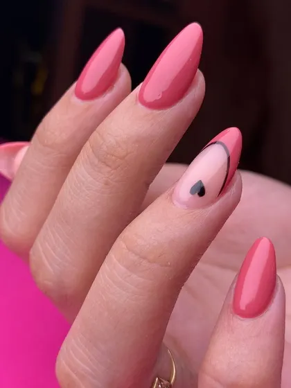 A chic and simple design in a beautiful mauve pink. The single accent nail with a minimalist heart and swirl adds a touch of modern romance.