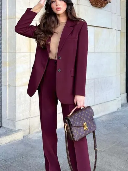 Your suit should be ready for any occasion, even travel. Here is one of my custom maroon pant suits, styled for a chic travel day. The comfortable fabric and impeccable fit mean you can step off a plane looking and feeling your best.
