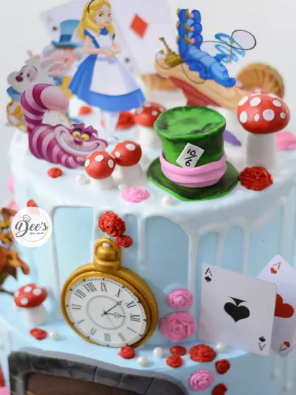 A close-up of the Mad Hatter's hat, the pocket watch, and playing cards, all bringing the mad tea party to life.