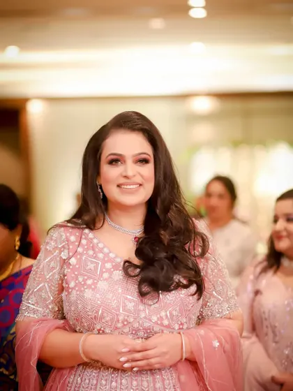 A beautiful, candid portrait of the bride-to-be at her engagement party. Her happy, welcoming smile is captured perfectly as she enjoys the celebration.