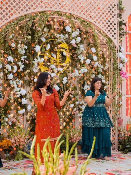The ladies of the family all smiles during their graceful performance.