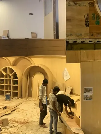 The site of a school interior build, showing the raw energy and activity as our team works to complete this all-plywood design.