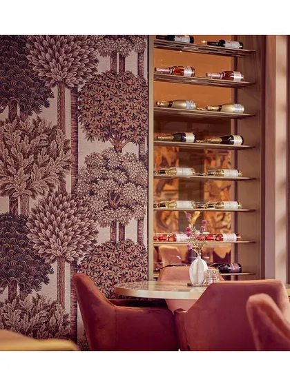 The Mont Royal wallcovering by Arte sets a warm, vibrant, and unforgettable tone. Its lush foliage pattern adds depth, character, and timeless charm, making it a perfect backdrop for a dining area or an intimate lounge.