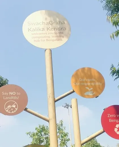Signs at SwachaGraha Kalika Kendra introduce composting and waste responsibility, part of the place we visited on our learning trip.