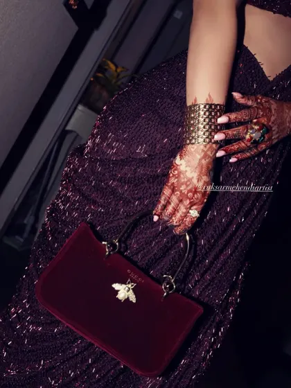 Another look at this beautiful stain, showing how it complements the client's outfit and accessories.