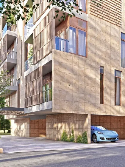 Renderings of 'Sriniketan', a guesthouse for pilgrims in Tirupati. The design features terraced gardens and an ornate facade inspired by temple architecture.