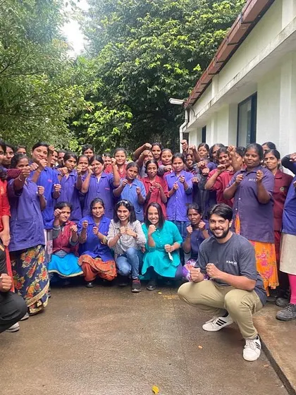 A large group of employees from a major national brewery after completing their women's self-defense program. We adapt our training to suit different corporate environments, from factory floors to office spaces.