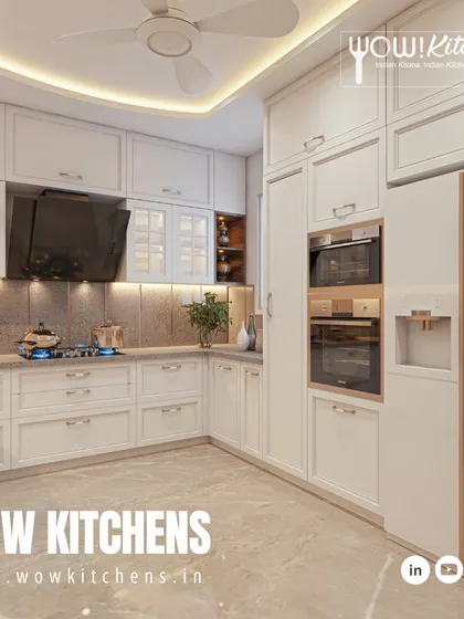 This angle highlights the integrated appliances, including the double oven and side-by-side refrigerator, which are seamlessly incorporated into the classic cabinetry.