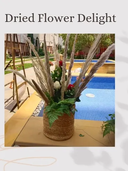 Highlighting the "Dried Flower Delight" trend, this post shows a rustic arrangement of pampas grass and other dried botanicals, perfect for a bohemian-themed event.