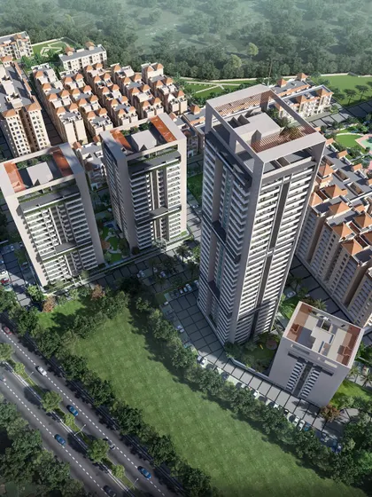 An aerial view of the high-rise development, illustrating the master plan and its integration with lower-density housing and green spaces.