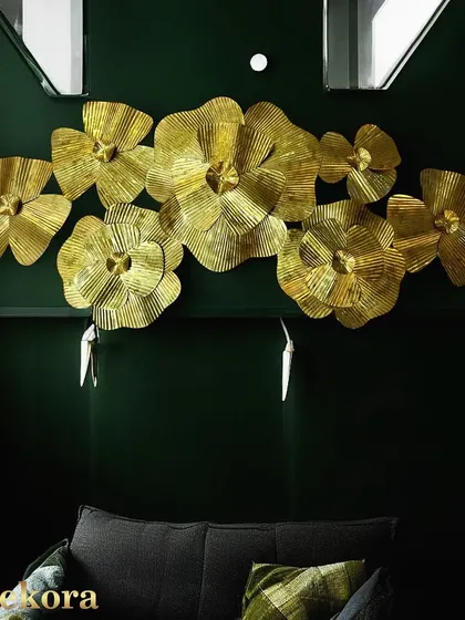 This golden flower wall decor art is perfect for adding a touch of glamour to a living room or bedroom.