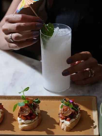 A refreshing cocktail paired with my classic bruschetta. The perfect combination for my Apero Hour.