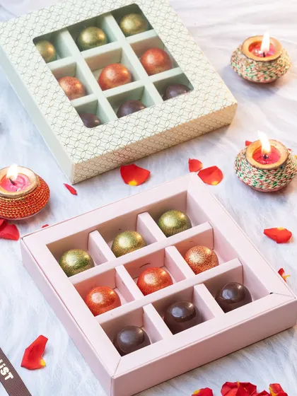 Our exclusive Raksha Bandhan gift hampers, featuring boxes of assorted, colourful bonbons. A sweet and elegant gift to celebrate the sibling bond.