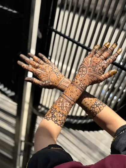This is a detailed view of my intricate bridal henna work. Each design is unique, combining traditional patterns like paisleys and mandalas with fine-line fillers to create a stunning, full-coverage look for your special day.