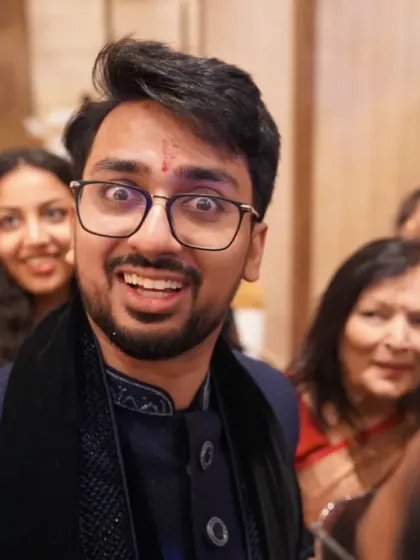 A guest's fun and quirky expression caught on camera. These candid shots add so much personality and humor to the final wedding gallery.