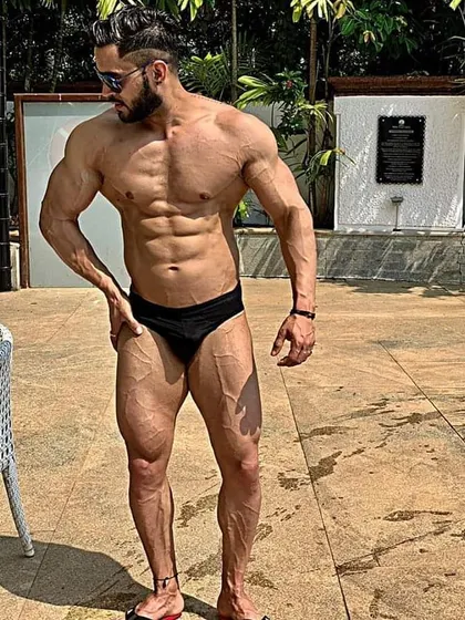 Another outdoor shot showing a conditioned physique. My programs are designed to get you results that you can proudly display anywhere.