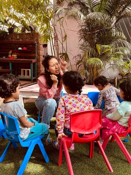 A Playmaker engages her group with an animated story. We believe in the power of stories to transport children to new worlds, spark their imagination, and build a strong foundation for literacy.