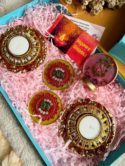 A Diwali hamper featuring my crystal tealight holders, "Shubh Labh" coasters, and a Ganesha container.