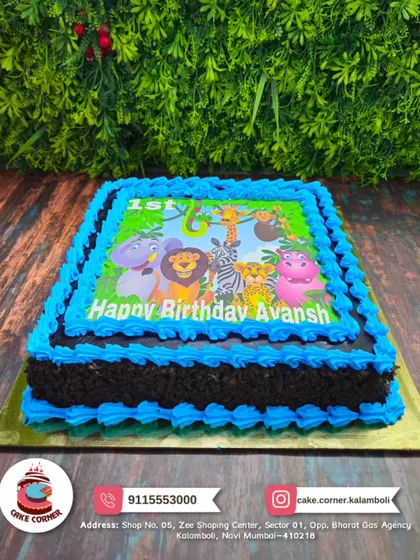A fun jungle animal photo cake for Avansh's first birthday. The bright colours and happy animals make it a great choice for a little one's party.