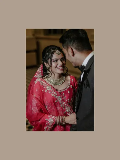 A beautiful, soft-focused portrait of the bride looking lovingly at the groom during their reception.