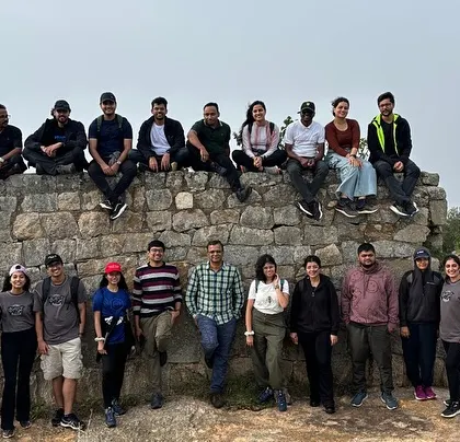 The group posing on the ancient fort walls at Kaiwara Hills. The trek offers a mix of history and nature.