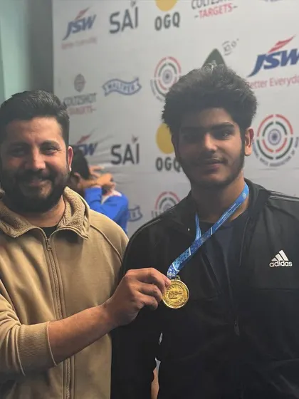 Presenting a gold medal to my student Daksh Choudhary, the 67th National Champion in 25m Jr. Sport Pistol. It is a privilege to guide such talented athletes on their path to success.