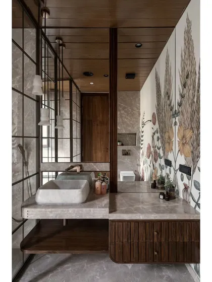 This bathroom is all about flower power. We used a large-scale floral wallpaper to create a stunning feature wall, balanced by natural stone and warm wood. The large window brings in beautiful light.