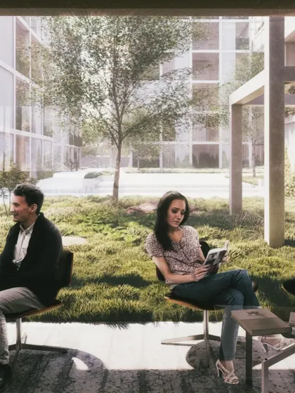 A serene moment in one of Pixel Housing's many green spaces, designed to offer residents a peaceful escape from urban life.